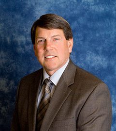 headshot of board member William Dery